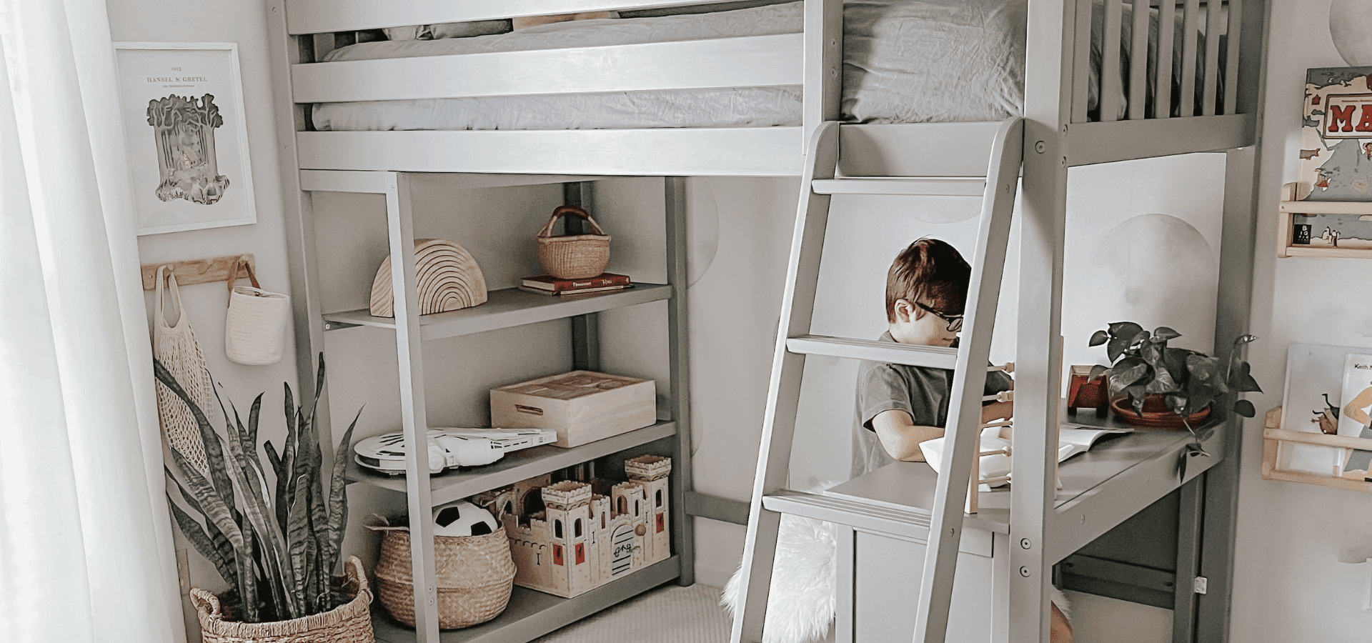 Grey loft bed with desk and bookcase