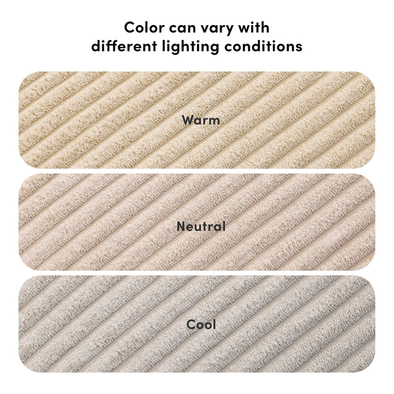 Beige plush ribbed towel swatches labeled Warm, Neutral, Cool under heading "Color can vary with different lighting conditions" showing lighting-dependent color variation