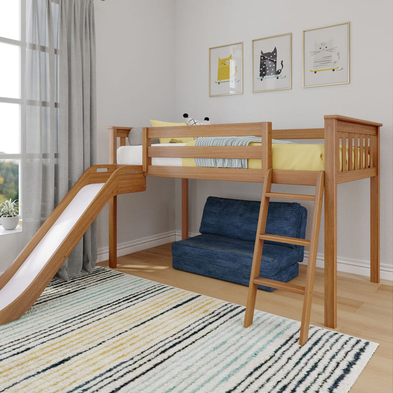 Wooden children's loft bed with slide and ladder, yellow bedding and blue sofa underneath in bright modern kids' bedroom with striped rug and framed cat wall art