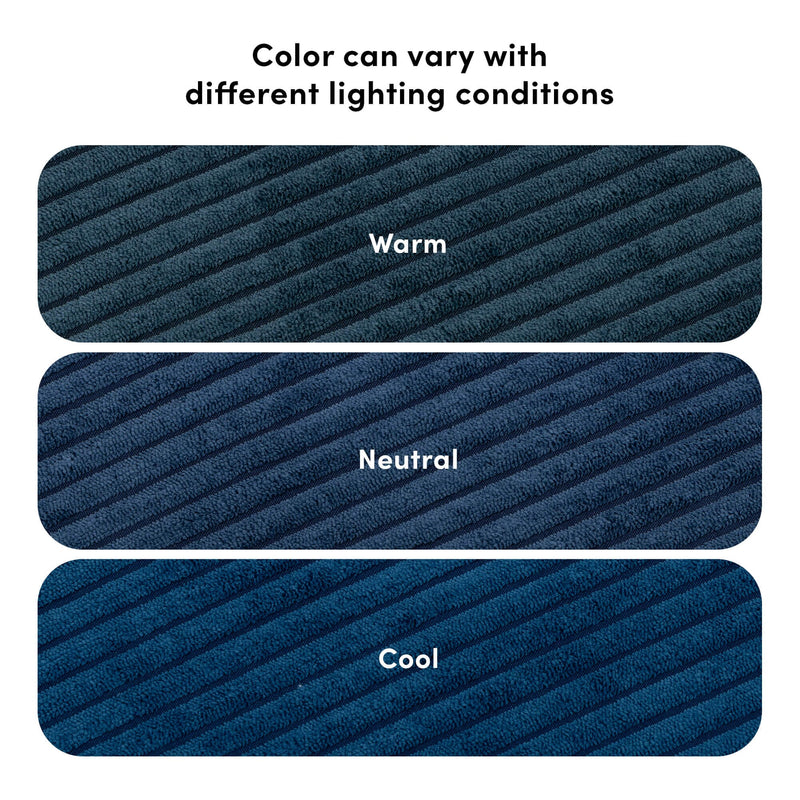 Three textured blue fabric swatches labeled Warm, Neutral, Cool showing how navy-blue color varies under different lighting conditions, color variation guide