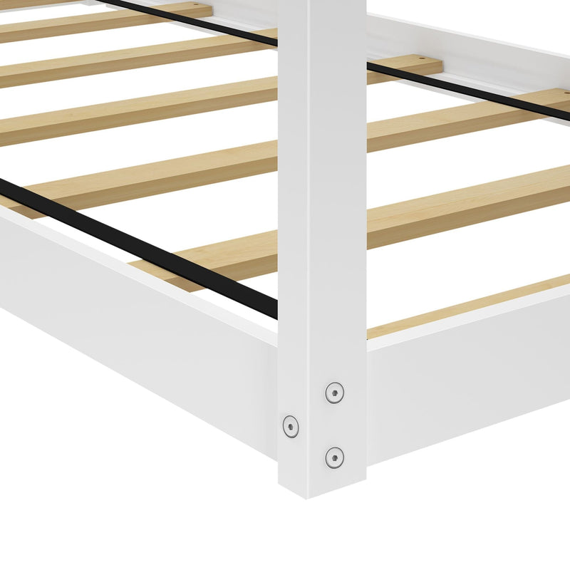 White wooden bed frame with slatted base and metal fittings.