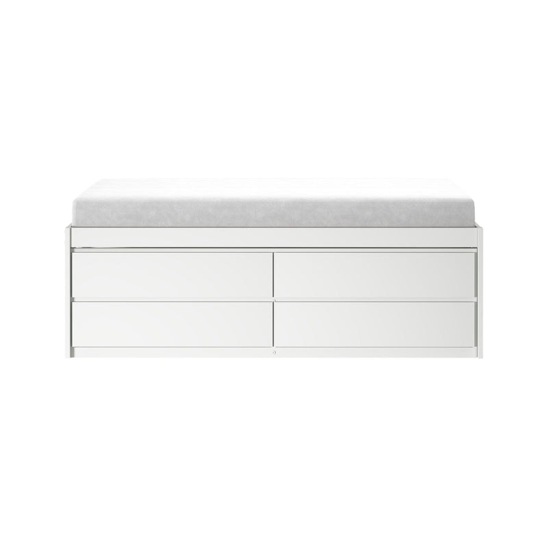 White baby changing pad on modern white dresser with storage drawers, minimalist nursery changing station