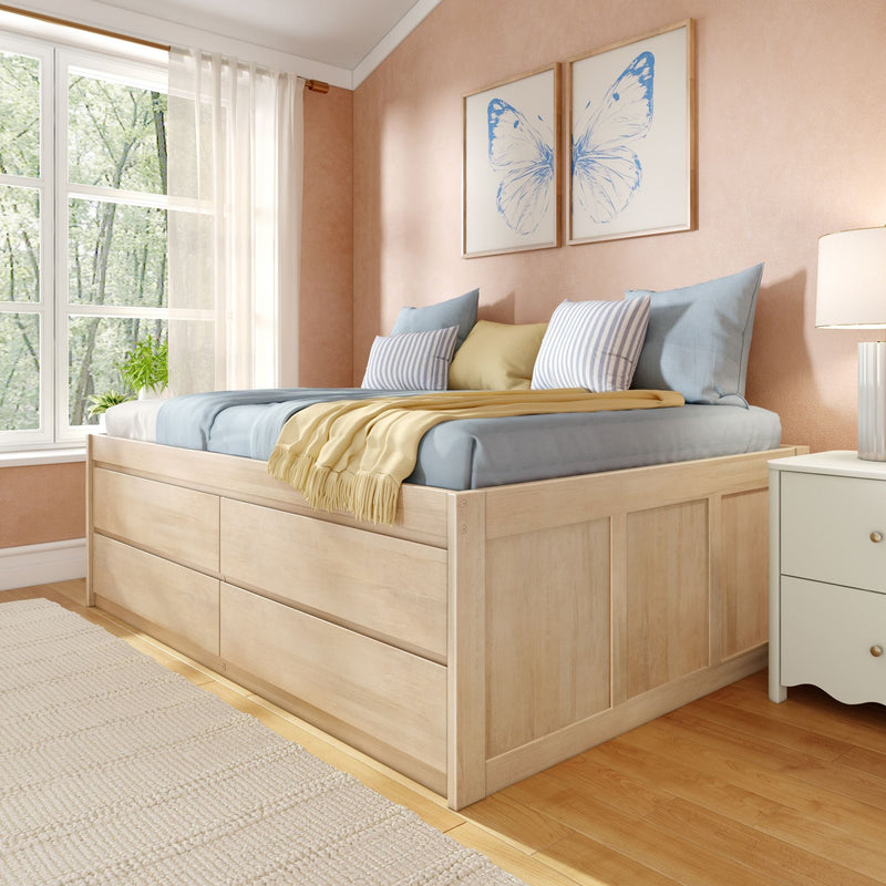 Cozy modern pastel bedroom with natural wood storage platform bed, striped pillows, yellow throw, butterfly wall art and sheer curtains