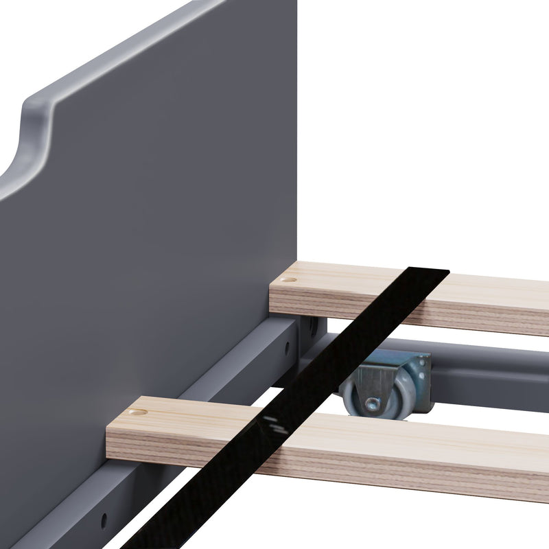 Close-up of metal bed frame with wooden slats, caster wheel, metal support bracket and black stabilizing strap for platform bed