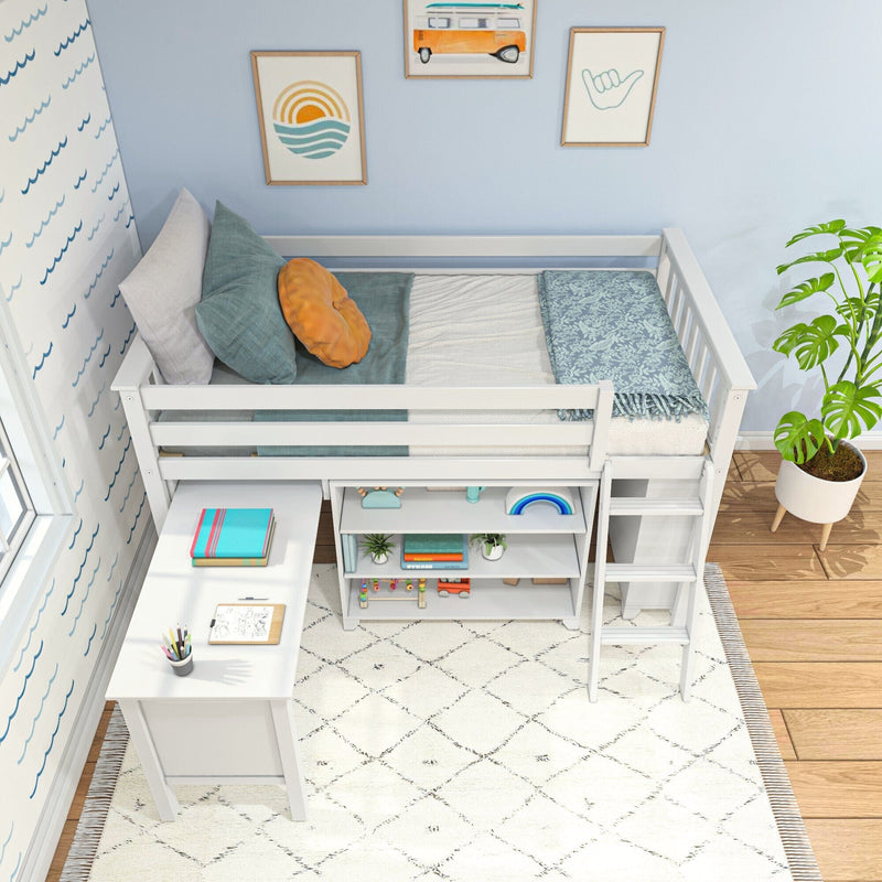 White wooden loft bed with built-in desk and storage shelves in a coastal-themed kids bedroom, ladder, blue and orange pillows, patterned throw blanket and potted plant