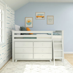 Child's bedroom with loft bed featuring built-in drawers and ladder, blue wall with art, and wave-patterned accent wall.