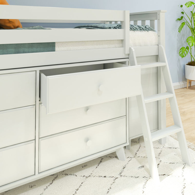 White loft bed with built-in storage drawers and ladder in a modern kids' bedroom with textured rug and potted plant