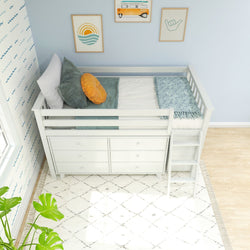 Modern children's bedroom featuring a white loft bed with storage drawers, decorative pillows, and wall art.