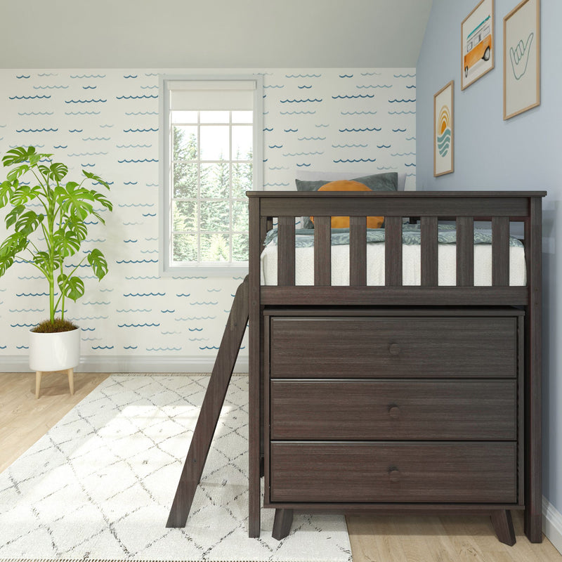 Coastal nursery kids bedroom with dark wood loft bed and dresser, blue wave wallpaper, framed artwork and potted monstera