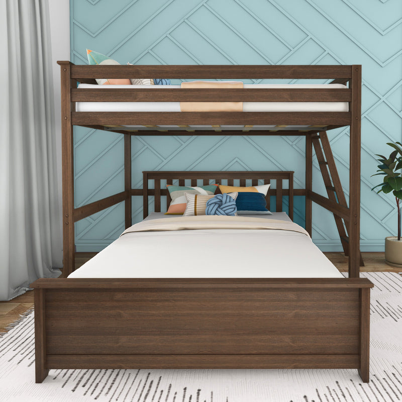 Brown twin-over-full wooden bunk bed with ladder and colorful decorative pillows against a blue geometric accent wall in a modern kids' bedroom