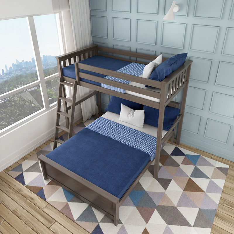 Modern wooden bunk bed with navy blue bedding, ladder and geometric rug in a bright kids' bedroom with light blue paneled wall and city skyline view through large window