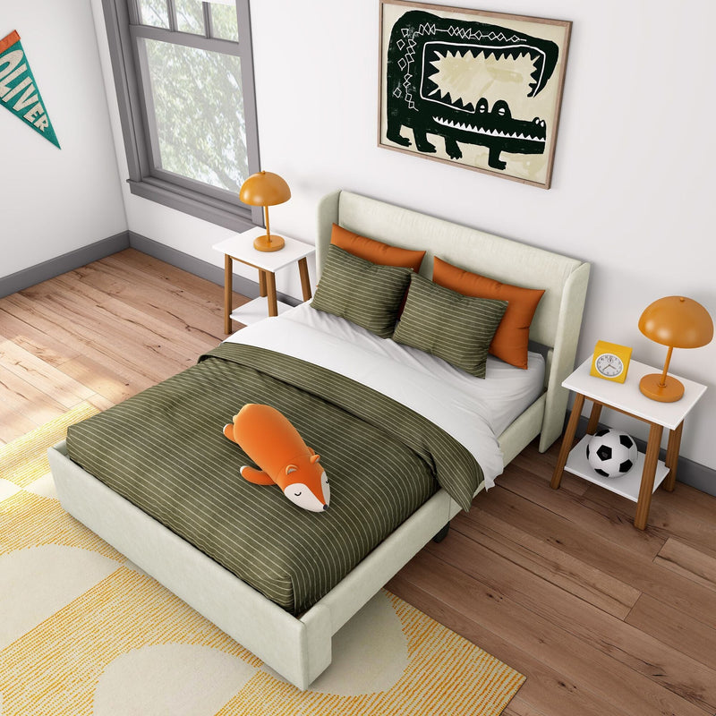 Kids bedroom with green striped bedding and orange accents, plush fox toy on bed, bedside tables with orange lamps, yellow alarm clock, soccer ball and framed crocodile wall art, modern kids room decor