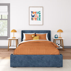 Modern kids bedroom with blue bedframe, orange bedding, and playful decor.