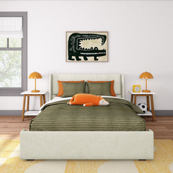Modern kids bedroom with green and orange decor, featuring a striped bedding set, playful stuffed toy, and colorful lamps.