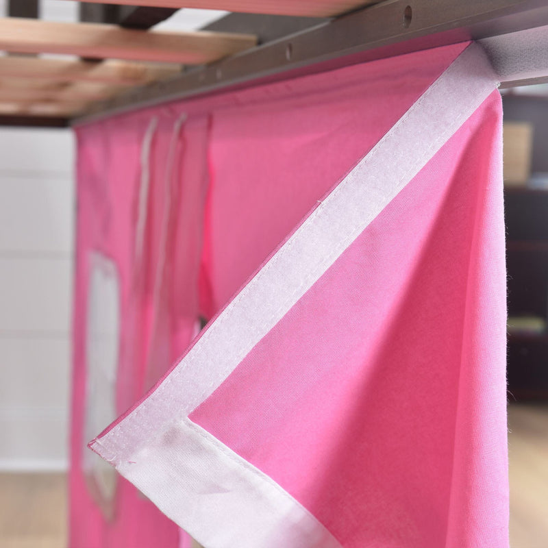 Close-up of pink fabric with velcro strips on a bed frame, showcasing a creative bedroom curtain design.