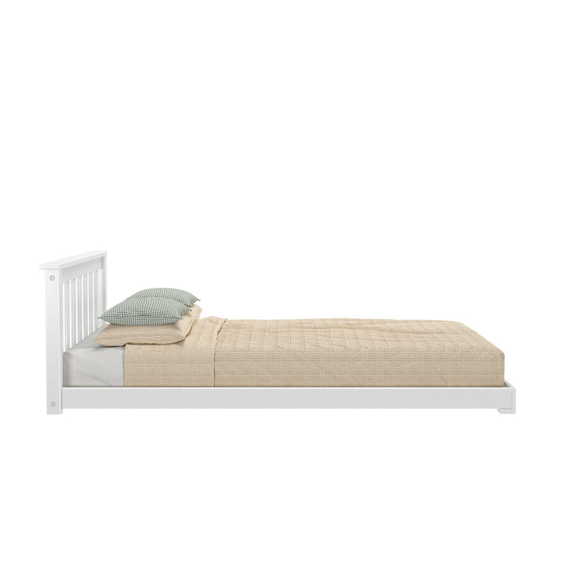 White wooden slatted bed frame with beige waffle-weave coverlet and green gingham pillows, side view