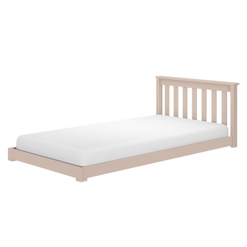 Beige wooden twin bed frame with slatted headboard and white mattress on a minimalist platform, isolated on a white background