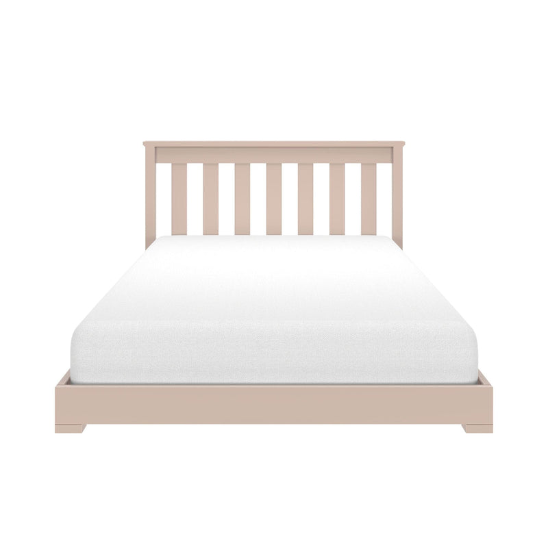 Beige wooden slatted headboard and platform bed with white mattress, minimalist twin bedroom furniture