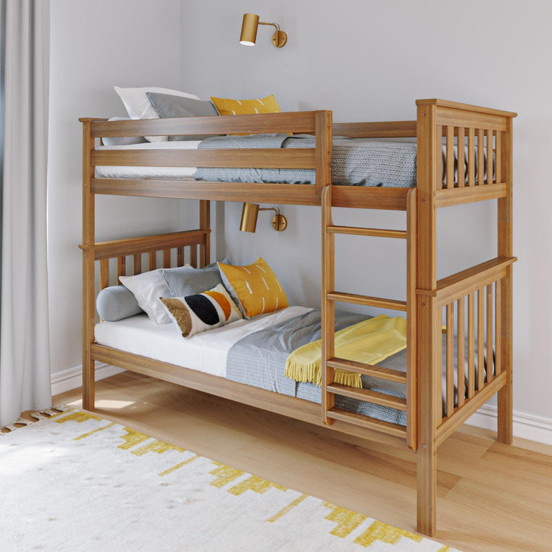 Contemporary solid wood bunk bed with ladder, gray and yellow bedding and pillows, wall-mounted reading lamps, light hardwood floor and patterned area rug