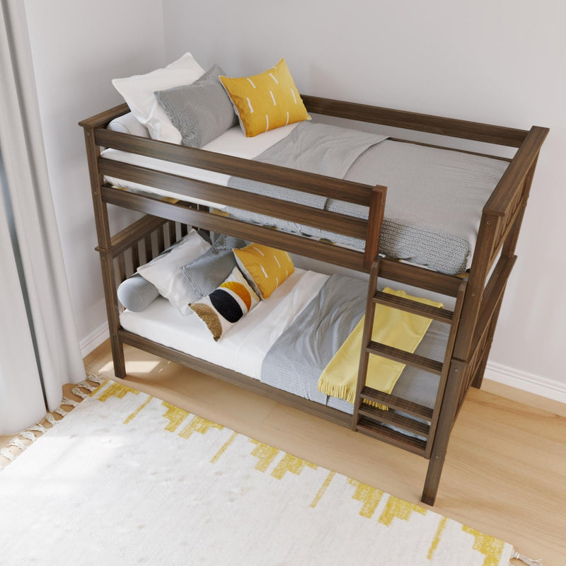 Modern wooden bunk bed with gray knit bedding, yellow accent pillows and ladder in a bright kids' bedroom