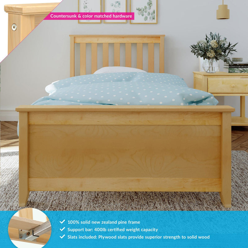 Solid New Zealand pine single bed frame with slatted headboard, light blue polka-dot duvet, matching pine bedside table and vase