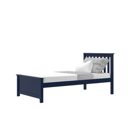 Twin-size navy blue wooden bed frame with slatted headboard, white mattress and gray pillows on white background