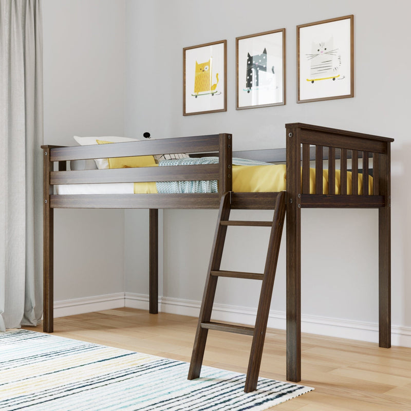 Dark wood loft bed with ladder in children's bedroom, yellow bedding and knitted throw, framed cat wall art and light gray curtains