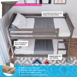 Low-profile gray solid New Zealand pine twin bunk bed for kids with angled reversible ladder, 400 lb capacity, slats included, fits standard mattress sizes