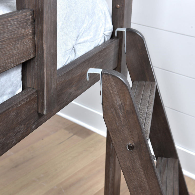 Brown wooden bunk bed ladder with metal safety hooks attached to rustic wood bed frame in modern bedroom