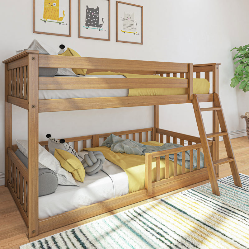 Wooden bunk bed in modern children's bedroom with yellow bedding, ladder, cozy pillows, framed cat prints, indoor plant and striped rug