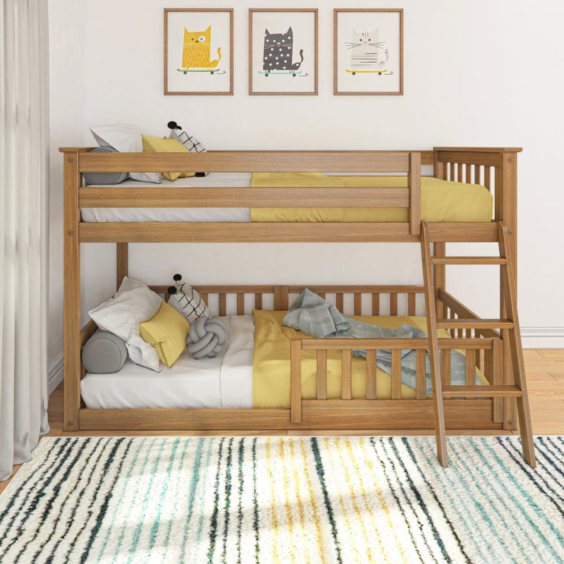 Wooden bunk bed with ladder and yellow bedding in modern kids bedroom featuring playful framed cat wall art and textured area rug