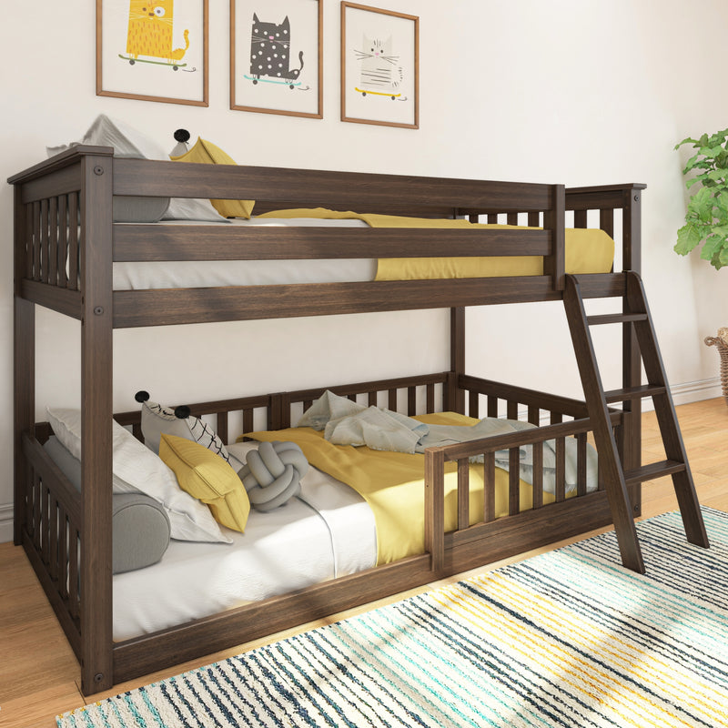 Solid wood bunk bed with ladder in a modern children's bedroom, yellow bedding and decorative pillows, framed cat wall art and striped area rug