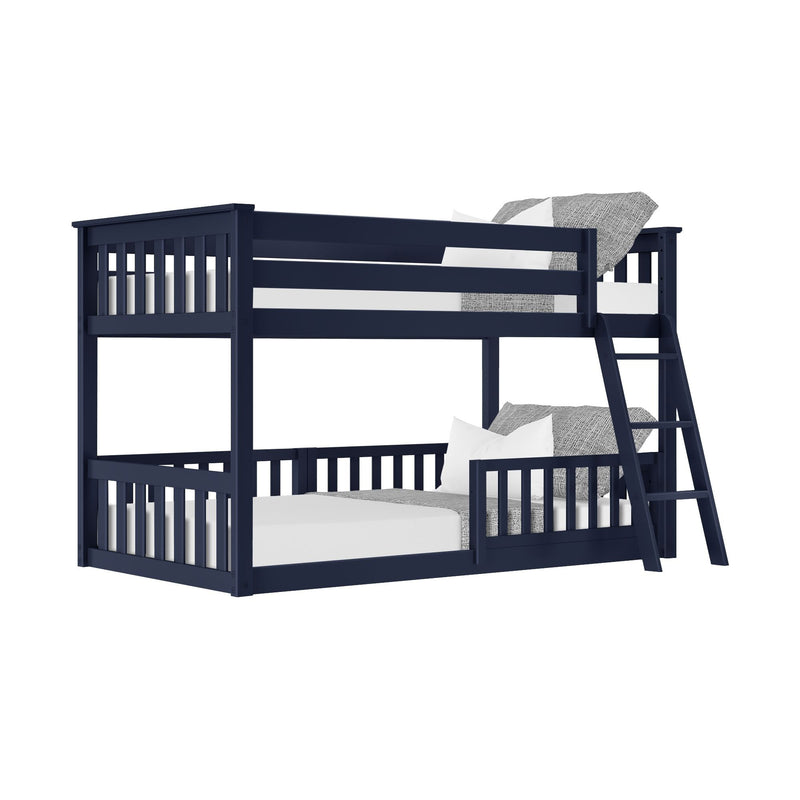 Navy blue wooden bunk bed with ladder and slatted guardrails, gray pillows and bedding, children's loft bed