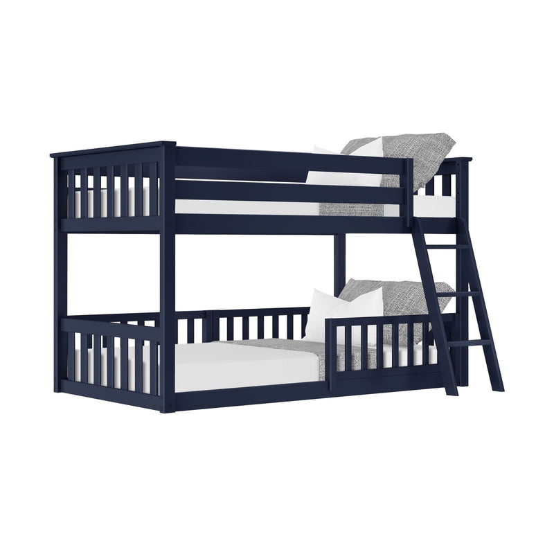 Navy blue wooden bunk bed with ladder, white mattresses and gray textured pillows and bedding — modern kids' bedroom furniture