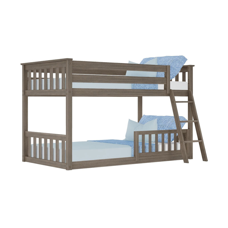 Gray wood twin-over-twin bunk bed with slatted safety rails and angled ladder, modern farmhouse kids' bedroom furniture with blue bedding and pillows