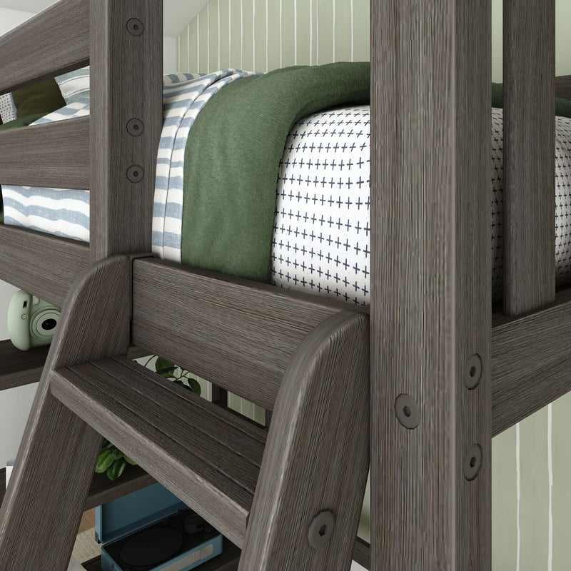 Wooden bunk bed with striped and cross-patterned bedding, featuring a cozy green blanket in a modern bedroom setting.