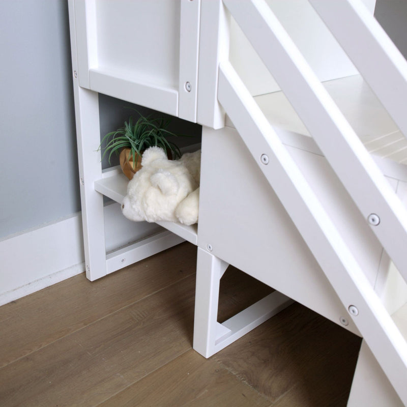 White wooden loft bed stairs with built-in storage shelves holding a plush teddy and potted succulent in a modern kids' bedroom design