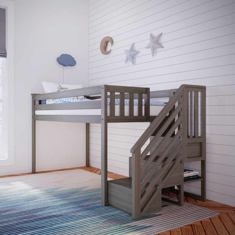 Gray wooden loft bunk bed with stairs in a children's bedroom featuring white shiplap walls, moon and star wall decor, blue polka-dot cloud cushion and striped area rug