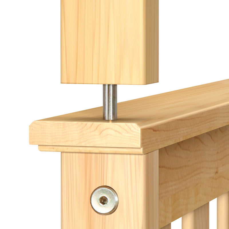 Close-up of light pine bed frame headboard rail with metal support pin and hex-socket screw bolted joint, showing natural wood grain