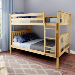 Light pine wooden bunk bed with built-in ladder, blue star-pattern pillows and gray bedding in a modern kids' bedroom with hardwood floor