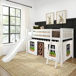 Children's loft bed with slide and playhouse design in a bright, modern bedroom.