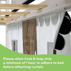 Loft bed with attached curtain, instructions for hook and loop strip adherence time.
