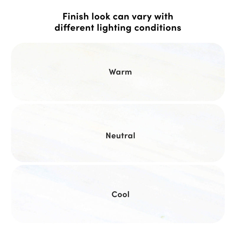 Marble-look tile finish swatches labeled Warm, Neutral and Cool beneath the heading "Finish look can vary with different lighting conditions," showing subtle stone texture