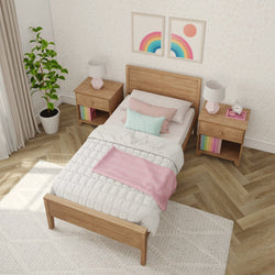 Cozy children's bedroom with a wooden bed, colorful decor, and modern furniture.