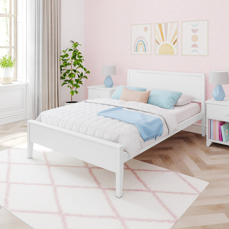 Modern white bedroom with stylish bed, pastel decor, and indoor plants on wooden flooring.