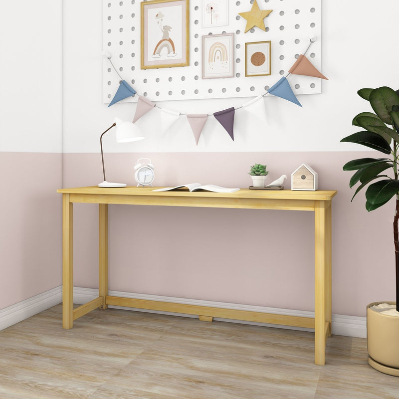 Pastel nursery children's desk with wooden table, white lamp, alarm clock, succulent and birdhouse under pegboard wall art and pastel bunting flags