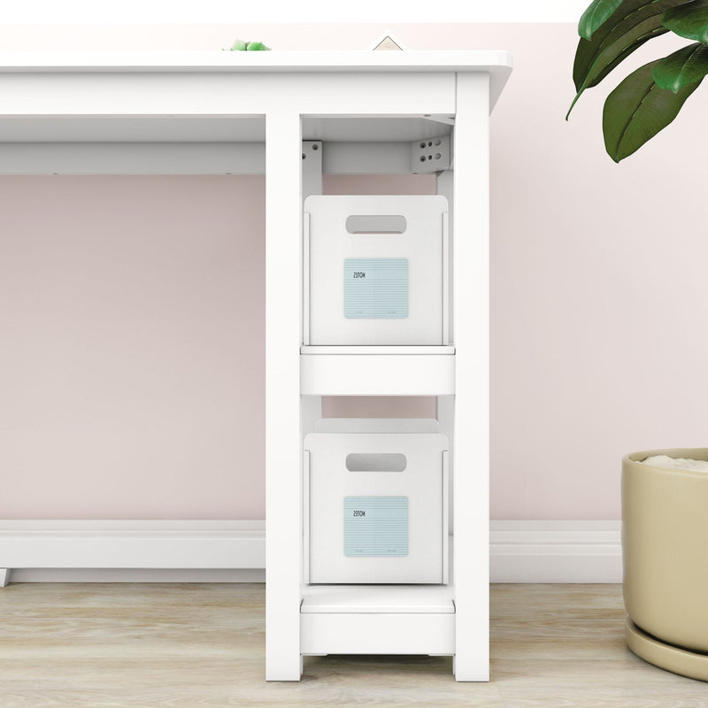 White under-desk organizer with two fabric storage bins on a modern white desk against a blush pink wall — minimalist home office storage