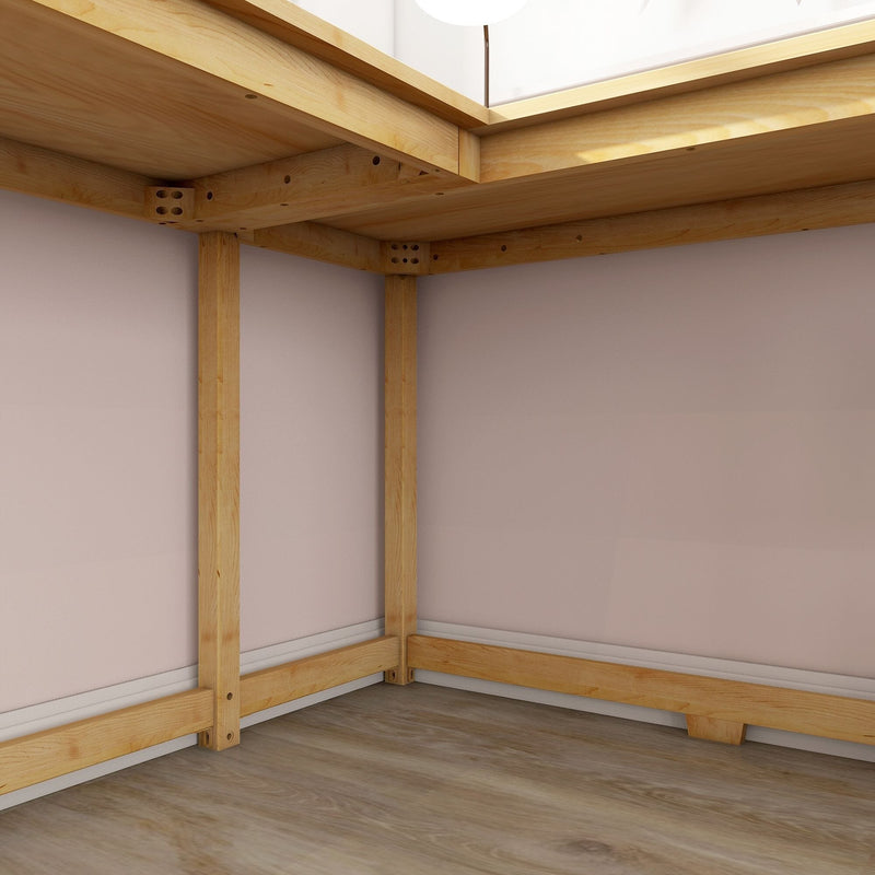 Close-up of light pine wooden platform/loft bed frame and vertical wall studs in a partially finished room corner with pale pink drywall and wood laminate flooring