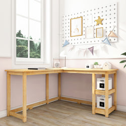 L-shaped wooden desk in a bright room with wall decorations and natural light from a large window.