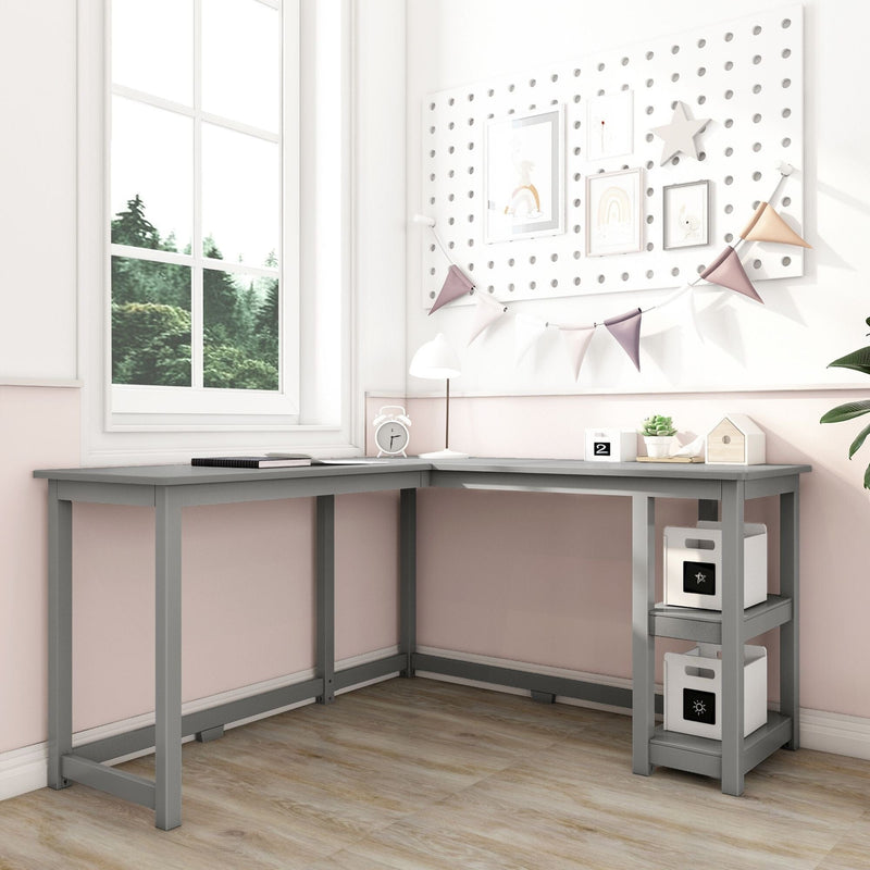 Modern grey L-shaped corner desk with built-in shelves in sunlit pink and white study nook, pegboard wall and bunting
